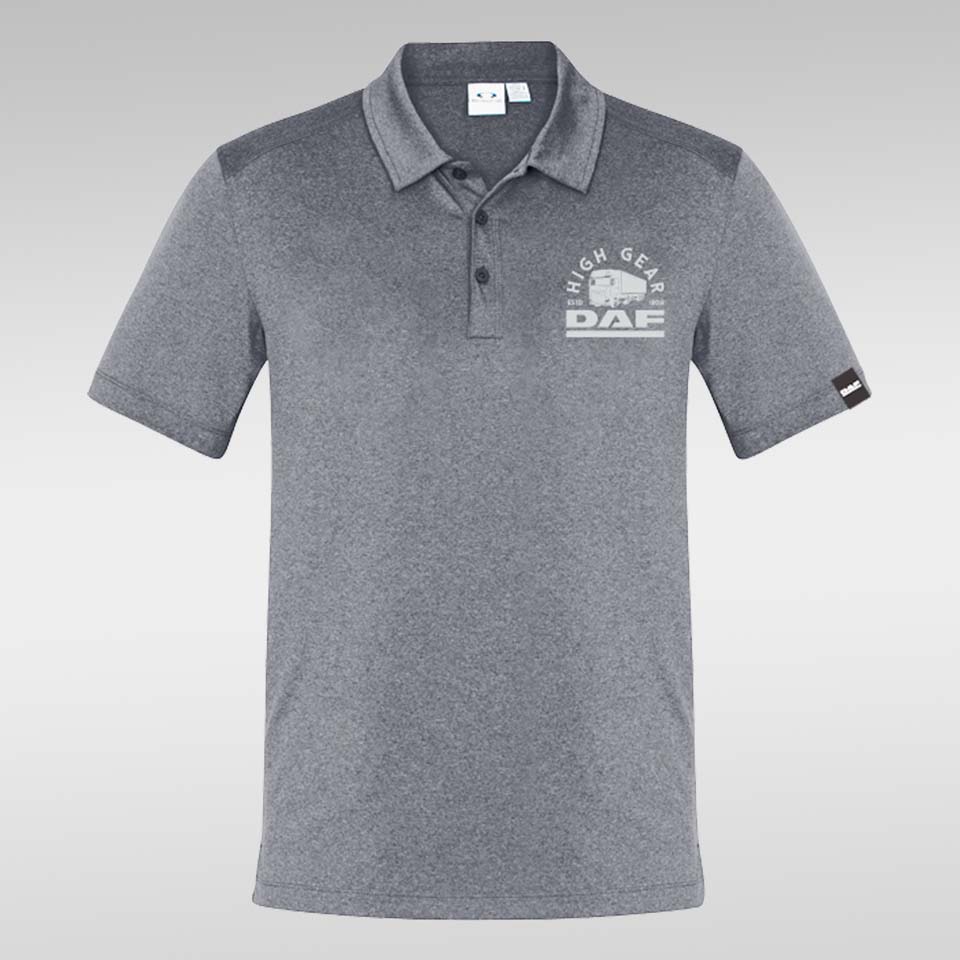 The POLO SHIRT DAF HIGH GEAR is a gray, cotton-feel micro polyester polo with a collar and three buttons. "HIGH GEAR DAF" with gear graphic is printed on the left chest, and a small black logo tag accents the left sleeve.