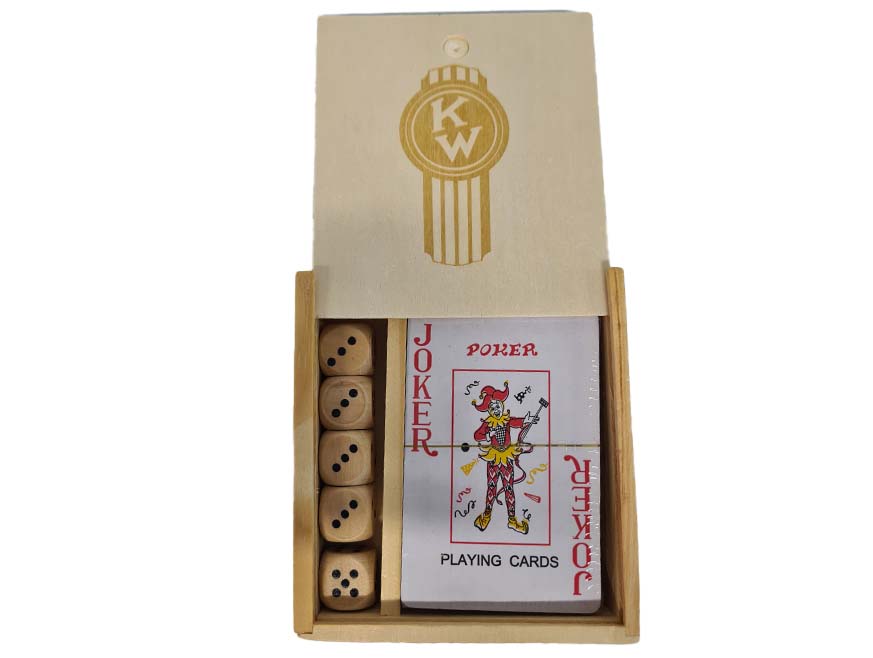 The GAME SET KW BOXED includes a wooden gift box with a sliding lid featuring KW initials in a circular design, five wooden dice, and a deck of playing cards topped with the joker card—a stylish Kenworth game set.