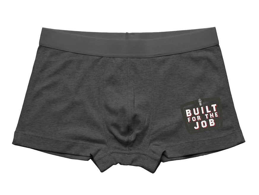 BOXER BRIEF KW MENS in charcoal gray features a graphic tool silhouette and "BUILT FOR THE JOB" in bold white and red on the right leg, offering everyday support.