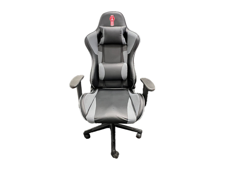 The CHAIR KW OFFICE BLACK is an ergonomic office chair in black and gray with armrests, a high backrest, headrest, lumbar support pillow, and five-wheel base, shown isolated on a white background.