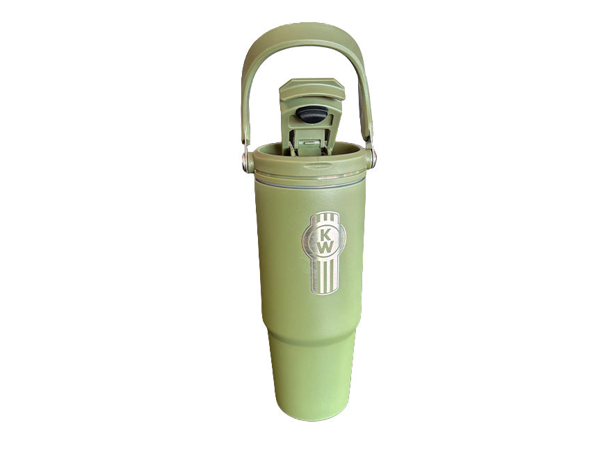 The BOTTLE KW TRAVEL GREEN INSULAT is a large, green insulated travel mug with a carrying handle, flip-top lid, and circular KW logo on the front. It keeps drinks hot or cold on the go—ideal for everyday use.