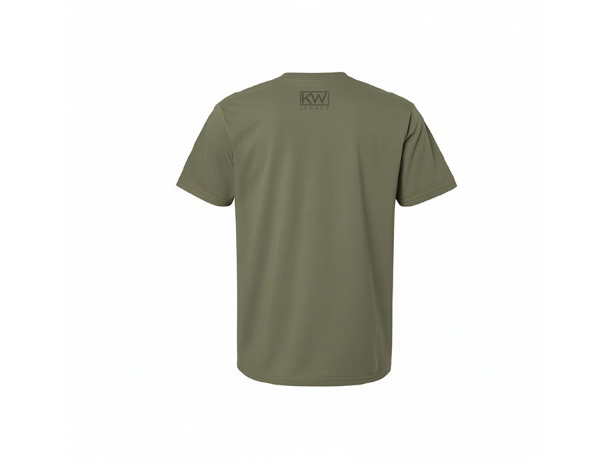 The Kenworth Legacy T-Shirt Green is displayed from the back on a plain white background, showcasing a small dark Kenworth Legacy logo near the upper center.