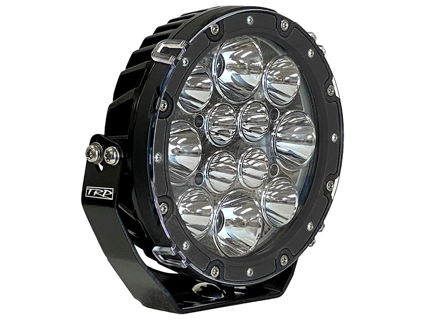 The LAMP DRIVING LIGHT LED 7 is a round, black off-road LED lamp with multiple reflective lenses and a rugged metal housing, carrying the TRP logo on its side bracket—ideal for high-performance illumination and auxiliary lighting.