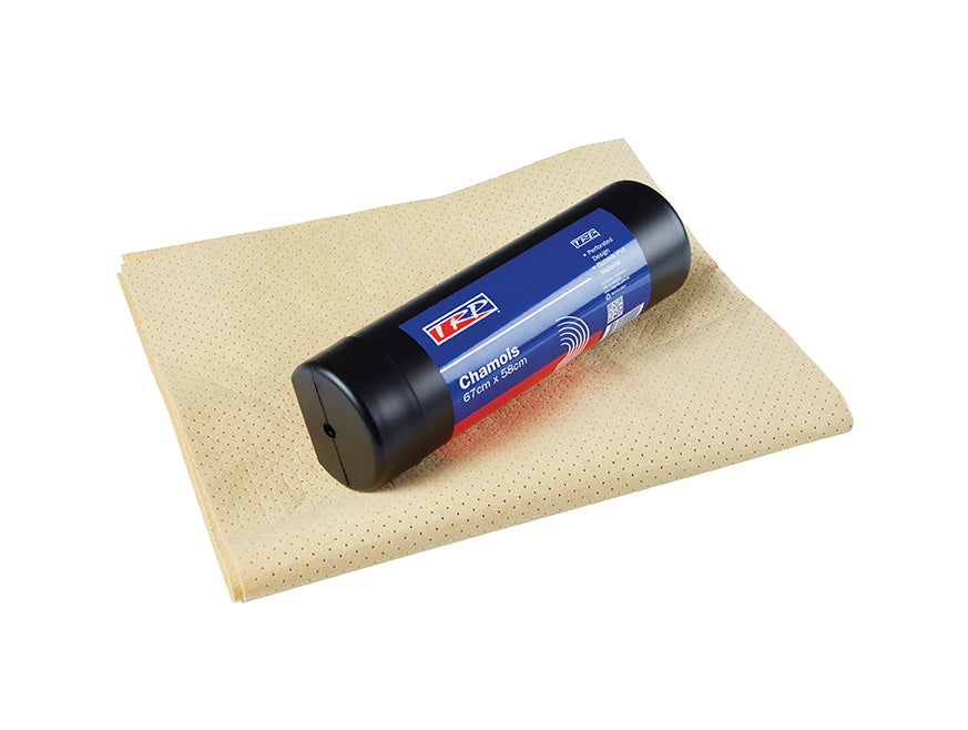 A beige CHAMMY PERFORATED 67CM X 58CM chamois drying towel lies flat with a black and blue cylindrical container labeled "Chamois" placed diagonally on top, all set against a white background.