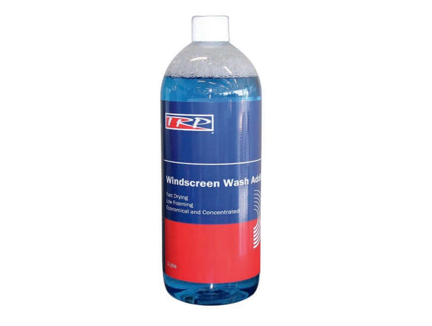 A clear plastic bottle labeled WINDSCREEN WASH 1 LITRE, filled with blue liquid. This concentrated, fast-drying, low-foaming, economical window wash comes with a white cap.