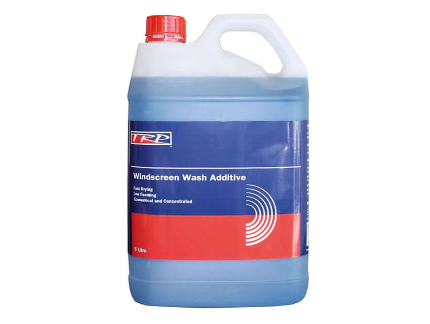 WINDSCREEN WASH 5 LITRE: 5-liter plastic container with red cap and blue label, containing blue liquid. The label promotes streak-free cleaning, fast drying, and low foaming.