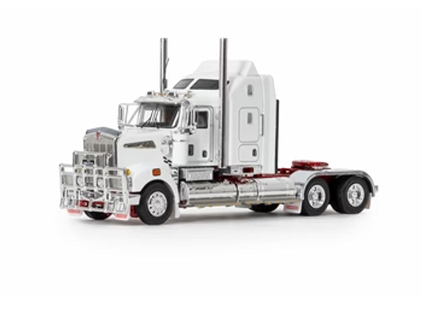 The MODEL T909 WHITE is a prime mover featuring chrome accents and a large front grille guard, shown angled from the front left side and isolated on a white background.