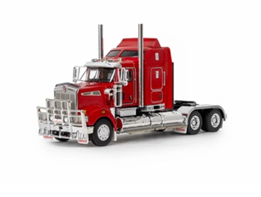 The MODEL T909 RED is a shiny red Kenworth T909 prime mover with chrome accents, dual exhaust pipes, and a sleeper cab, shown on a white background.