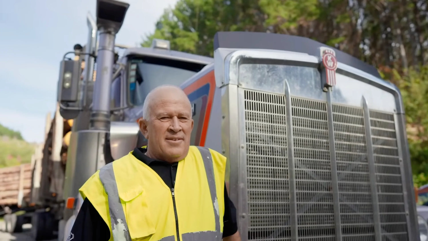 Warwick Wilshier Kenworth: A Life in Logging and a Legacy on the Road with Kenworth truck in background.