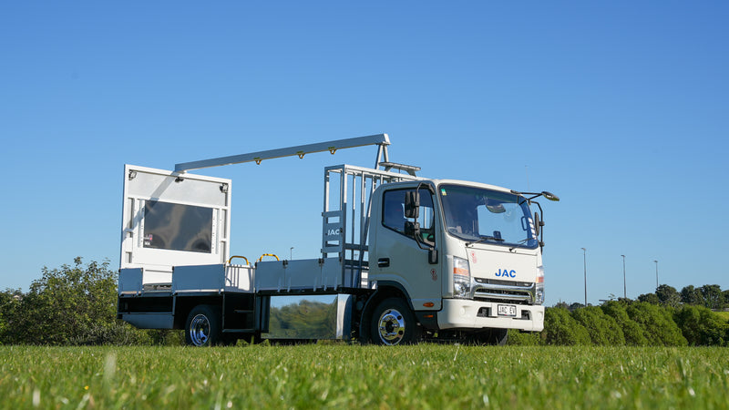 Heineken branded JAC truck used for beverage delivery