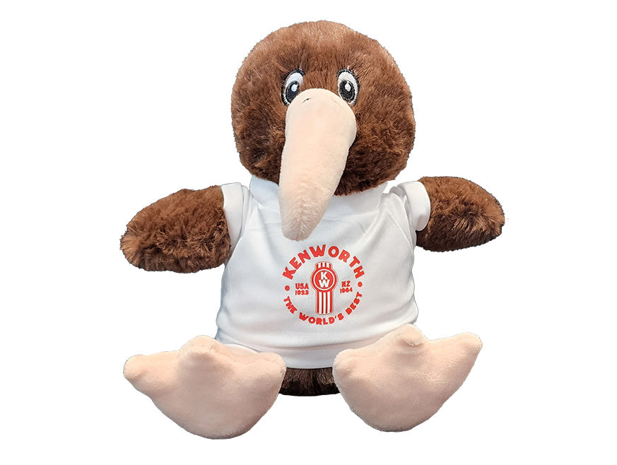 TOY KW KEV THE KIWI SOFT TOY is a brown plush kiwi wearing a white T-shirt with a red Kenworth The World's Best logo, perfect for truck fans and displayed against a white background.