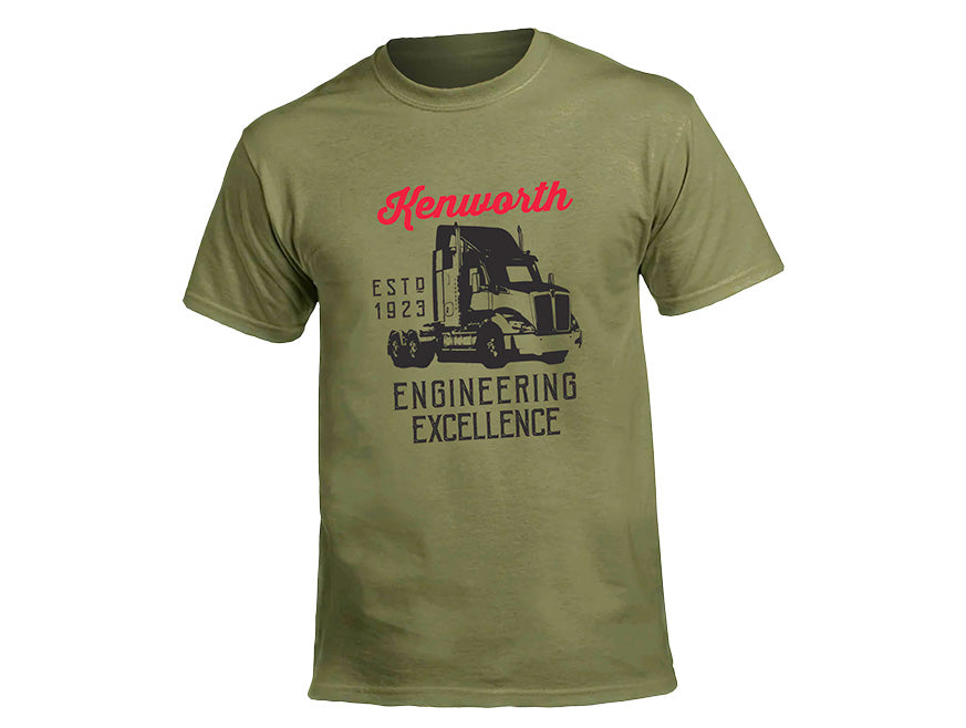 The TEE SHIRT EXCELLENCE GREEN features an olive green design with a bold semi-truck graphic, red Kenworth logo, and black "ESTD 1923 ENGINEERING EXCELLENCE" text—ideal for fans of Kenworth trucks and engineering excellence.