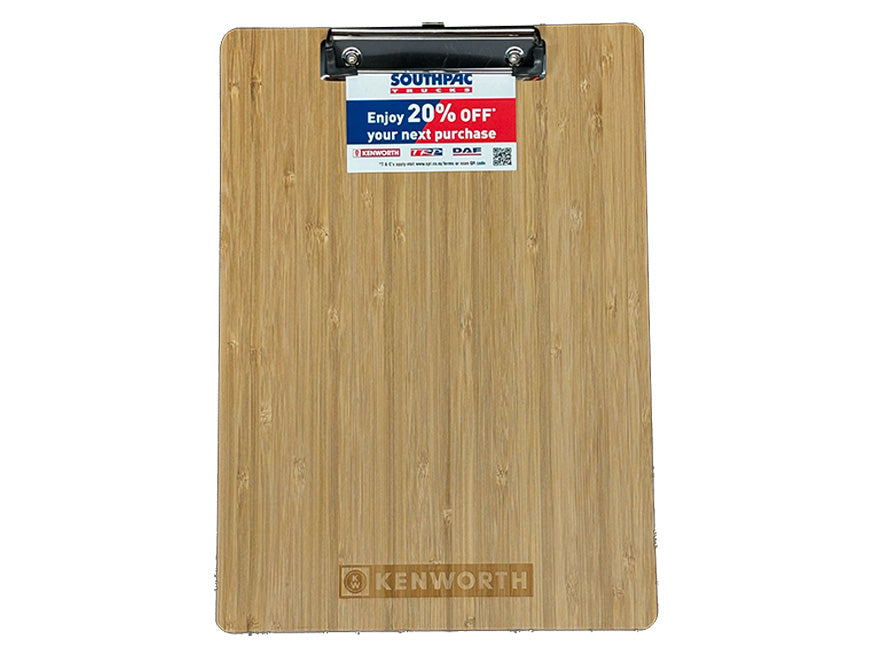 The CLIPBOARD KW, a bamboo clipboard with a metal clip, displays a voucher reading "Enjoy 20% OFF your next purchase," with Kenworth branding engraved at the bottom.