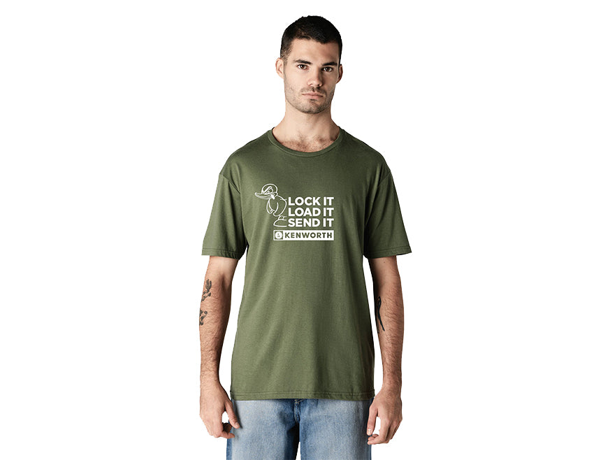 A man stands facing forward against a white background, wearing the TEE SHIRT KW LOCK IT in military green with "Lock It, Load It, Send It" and a Kenworth logo, showcasing a work-inspired style.