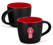 The MUG KW COFFEE features a stylish two-tone design with a black exterior, bold red interior, and the iconic red and white circular Kenworth K and W emblem on the front.