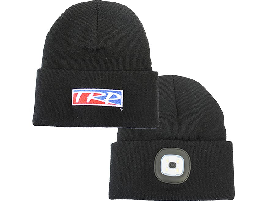 The BEANIE TRP BLACK LED is a black knit beanie with a rectangular LED light in the cuff, ideal for cold-weather activities.