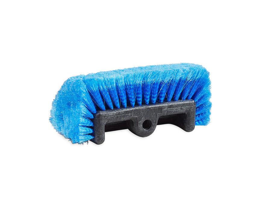 The BRUSH HEAD 10 QUAD is a blue, curved TRP brush head with stiff bristles and a black plastic base featuring a handle attachment hole, designed for reliable cleaning. Shown on a white background.