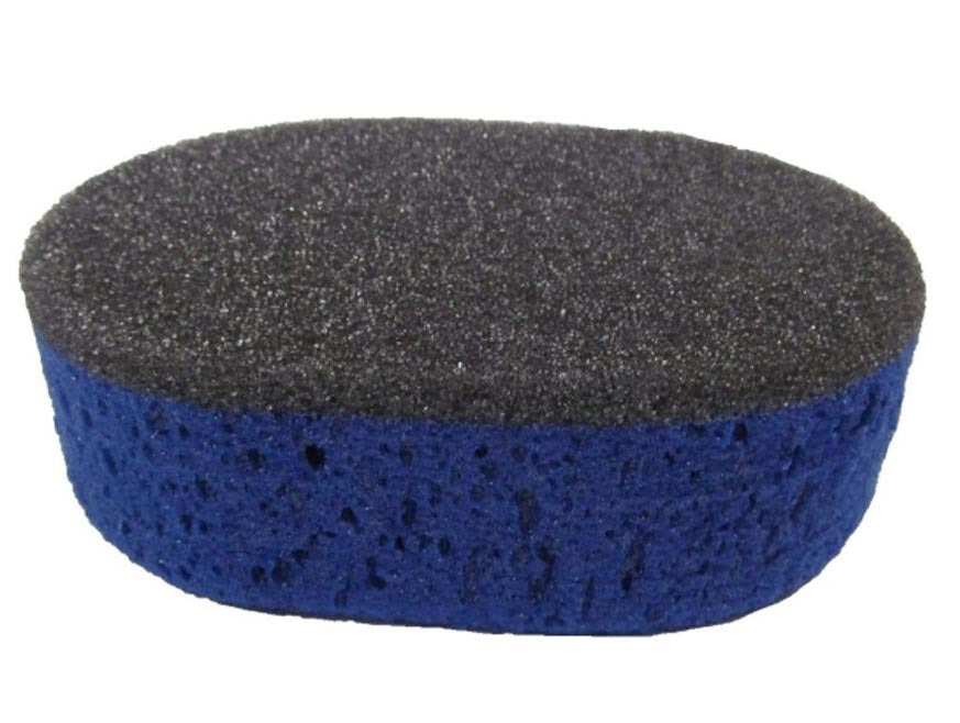 The SPONGE BUG DUAL SURFACE features a two-layer oval design with a black, smooth top and blue, porous bottom—perfect for removing bugs and road grime. Shown against a white background.