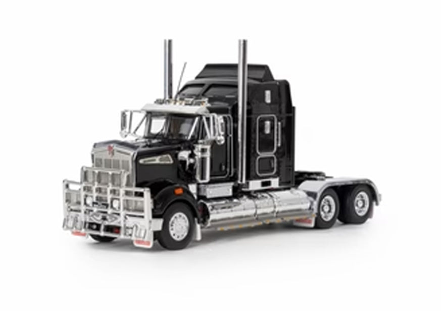 The MODEL T909 BLACK is a detailed scale model of a Kenworth T909 semi-truck cab, featuring chrome accents, tall exhaust stacks, and a robust grille guard—an ideal collectible displayed against a white background.