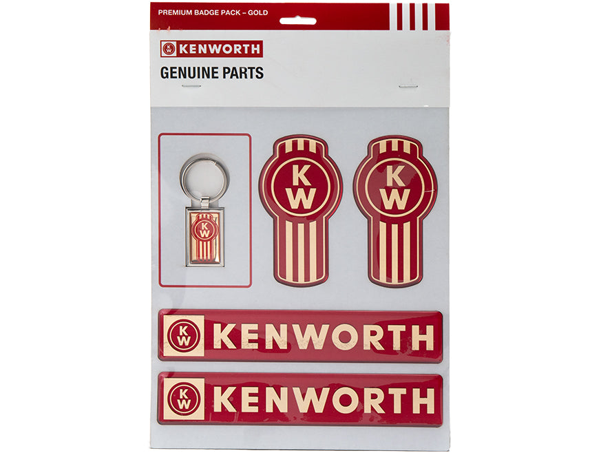 The DECAL KW SET GOLD PREMIUM includes a Kenworth keychain, two round red and gold logo stickers, and two rectangular decal stickers—all labeled as genuine Kenworth parts.
